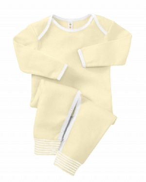 Jessie 1x1 Rib Ringer Romper - 100% combed cotton. 1x1 rib; contrast at lap shoulders and cuffs; snap closure for a "diaper friendly" fit; yarn-dyed stripe at leg openings.